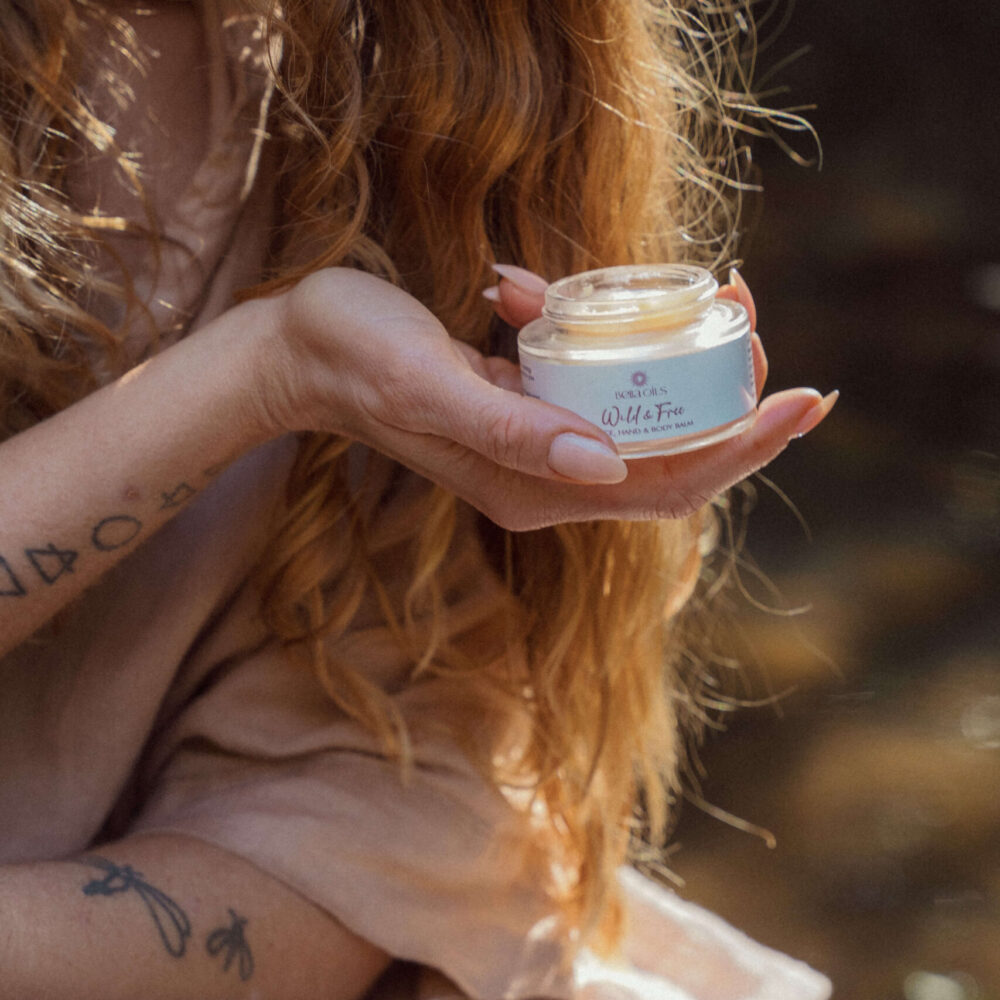 Apply Bella Oils Wild & Free vegan hand, body and face balm to deeply nourish and hydrate dry skin.